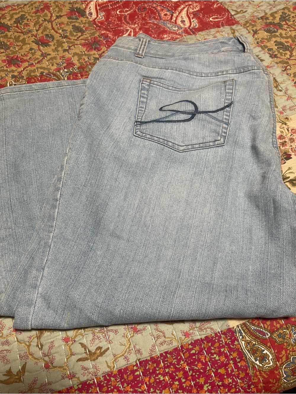 Light Blue Women's Denim Jeans with Subtle Back Pocket Stitching